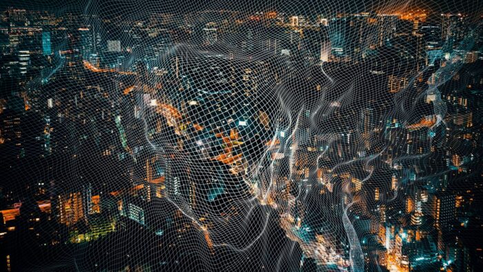 representation of augmented reality (a grid above a cityscape at night)