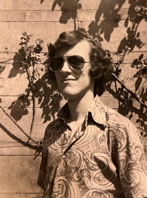 Tony Nixon in 1978 wearing sunglasses and a patterned shirt